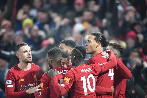 Liverpool team celebrating a goal 