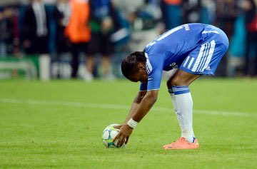 former Chelsea striker Didier Drogba preparing to take the Champions League winning penalty 