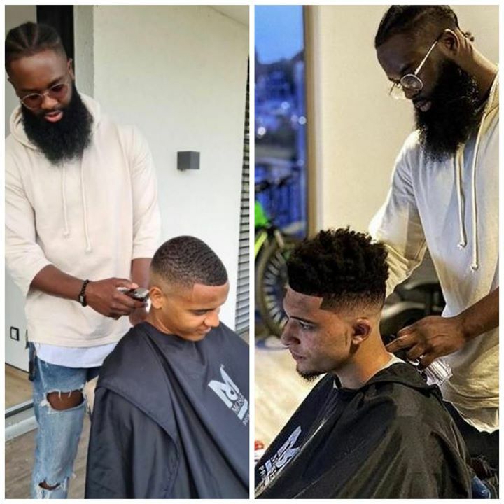 Jadon Sancho and Manuel Akanji having a haircut in their different apartments but by the same barber 