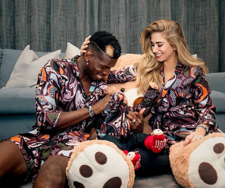 Maria Zulay Salaues and her hobby Paul Pogba playing with their newborn. 