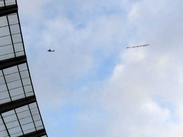"White Lives Matter Burnley" banner flying over Etihad stadium 
