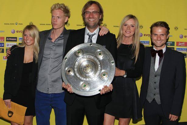 Left: Marc's girlfriend, Marc, Jurgen Klopp, his wife Ulla Sandrock, and his stepson, Dennis.