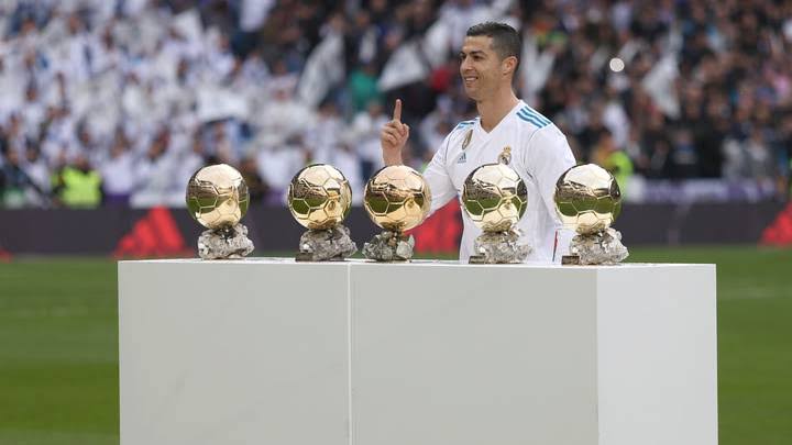 Ronaldo displaying his five Ballon d'Or 