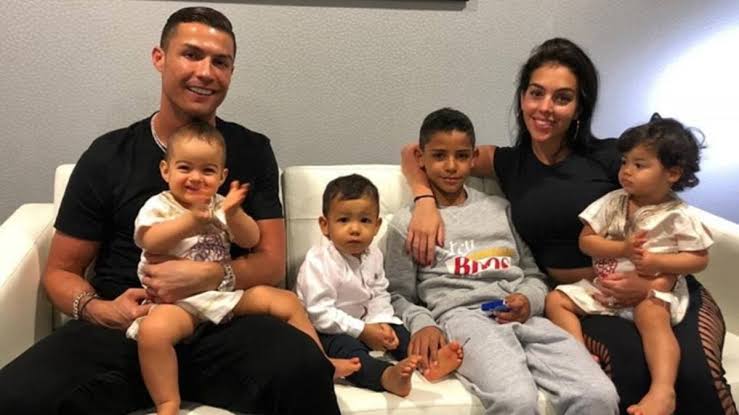 Cristiano Ronaldo and his four children 