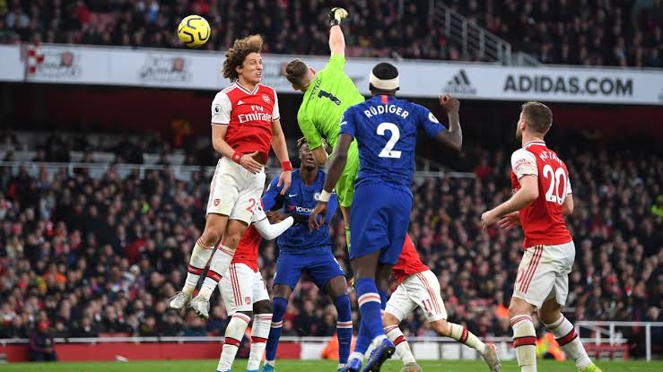 Arsenal vs Chelsea Chelsea and Arsenal players contending for the ball 