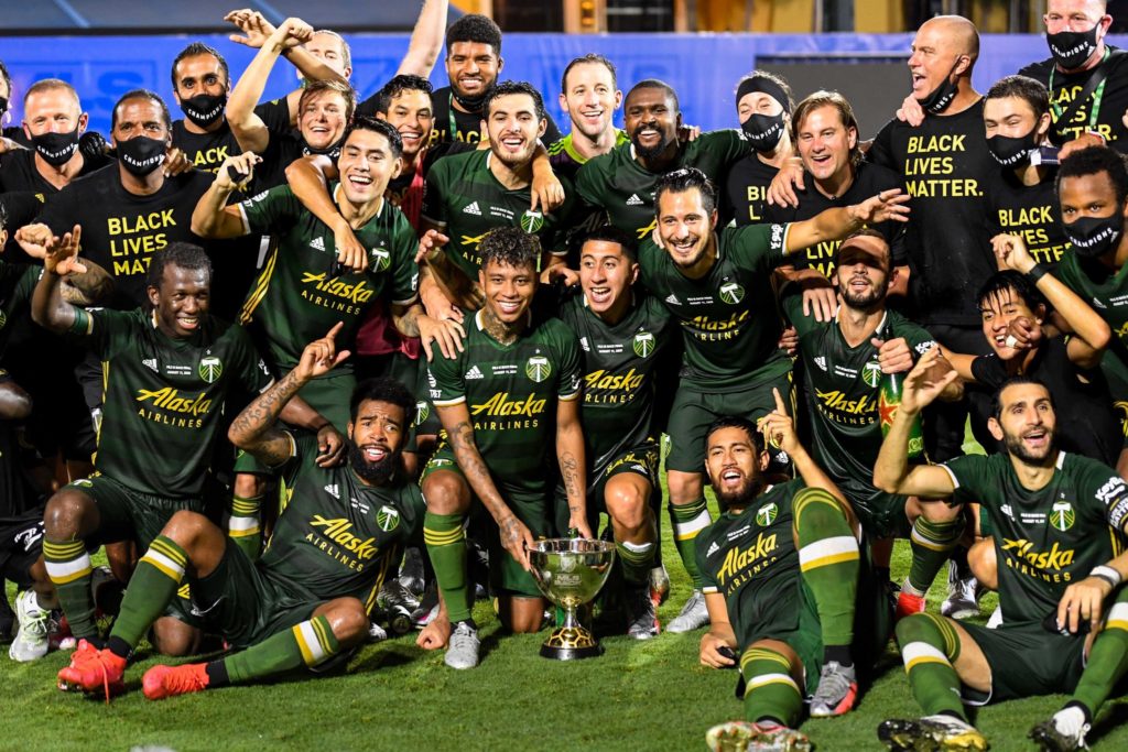 Portland Timbers players celebrating their MLS is back victory 