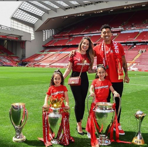 Family time: Liverpool striker, Roberto Firmino shows love to wife Larissa  Pereira, children