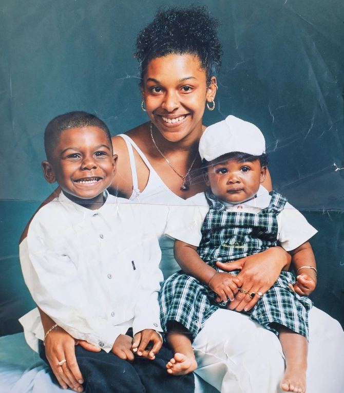 Baby Ainsley Maitland-Niles, his mother Jules and brother Cordi