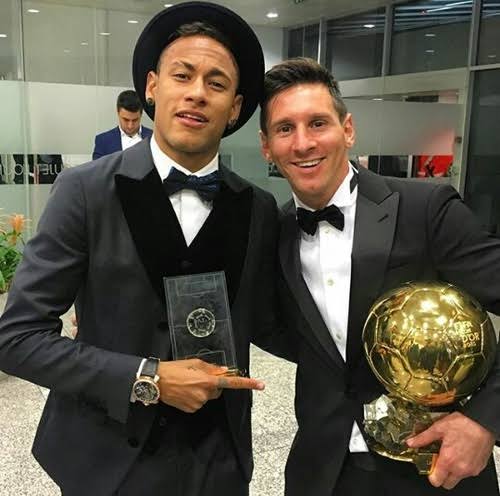 Neymar and Lionel Messi with the Ballon d'Or in 2015