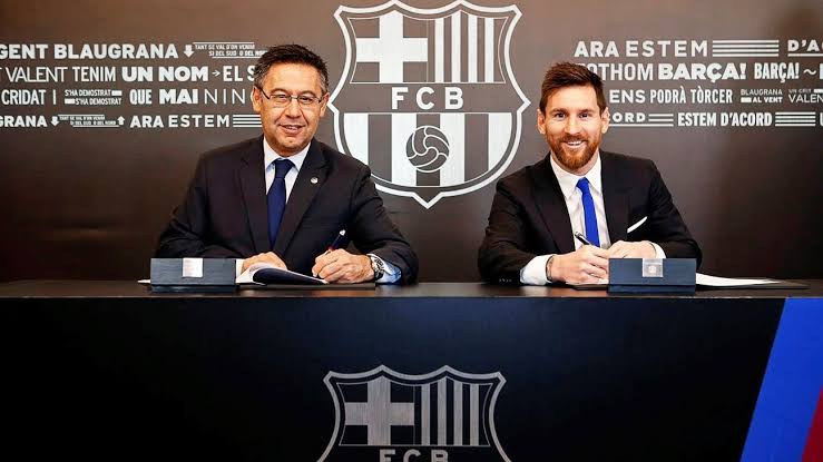 Lionel Messi and Barcelona president Josep Maria Bartomeu