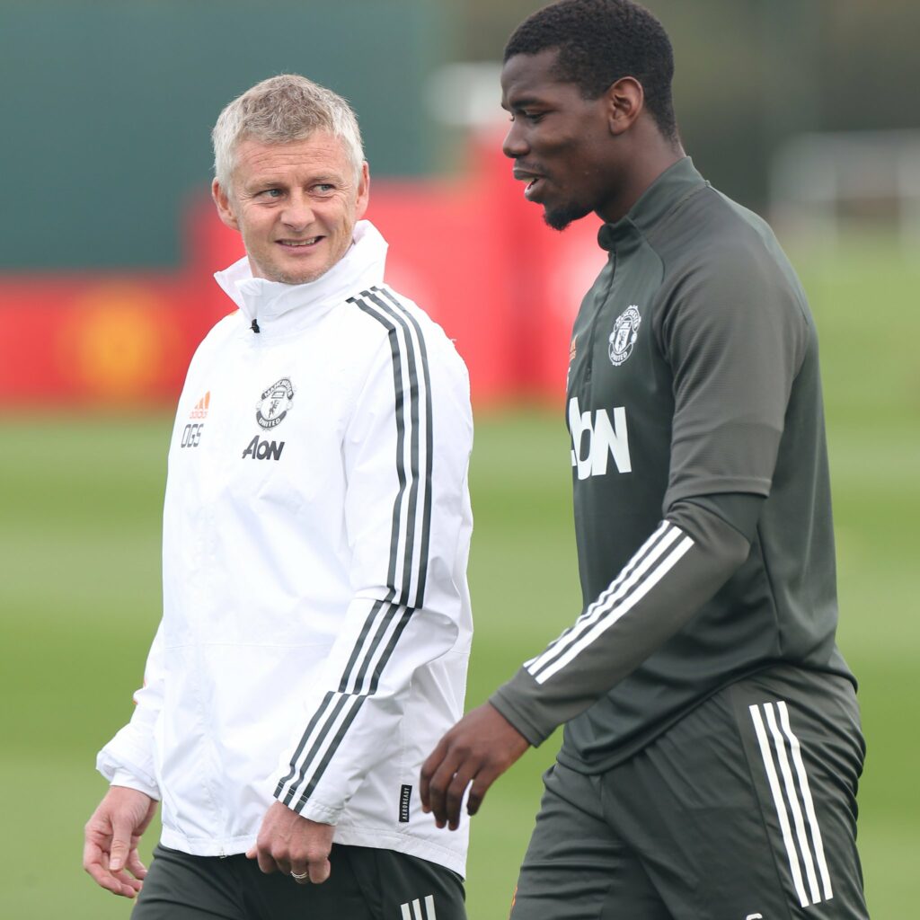 Manchester United manager Ole Gunnar Solskjaer and his midfielder Paul Pogba in training on Friday.