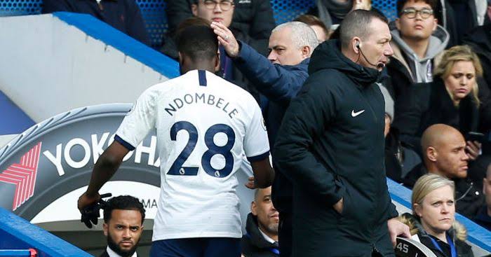 Tanguy Ndombele walking to the bench after he was substituted from a match and got a tap from Mourinho.