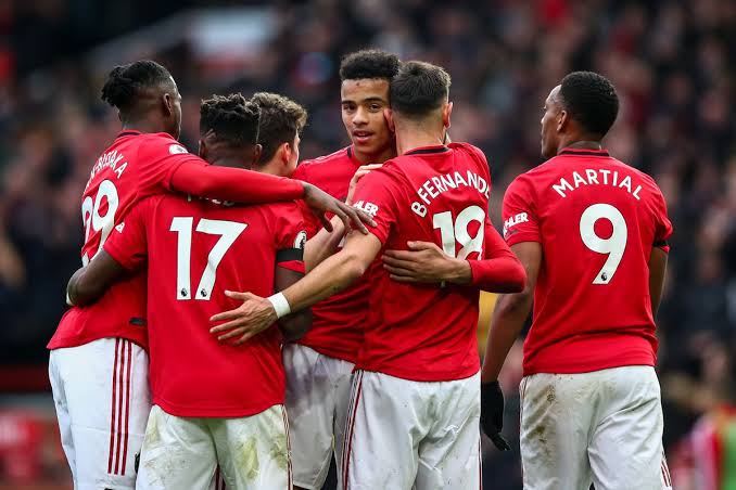 Mason Greenwood celebrating a goal with his Manchester United's teammates. 