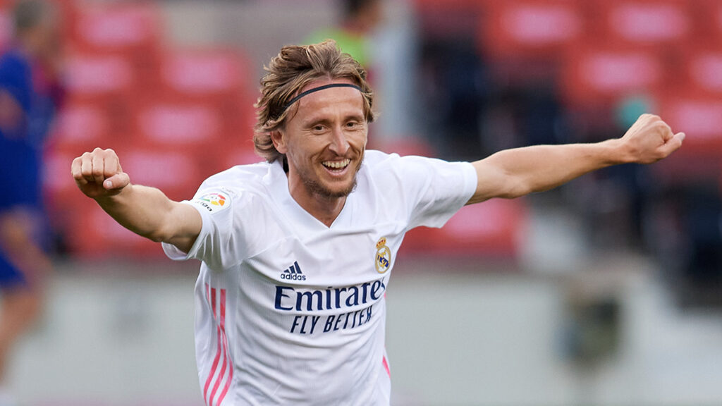 Real Madrid's Luka Modric celebrates his goal against FC Barcelona.