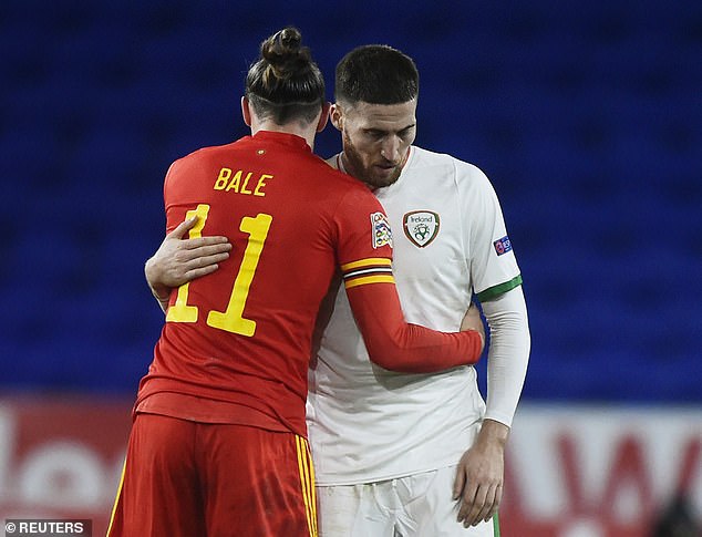 Gareth Bale hugging Matt Doherty on Sunday after Wales's 1-0 victory over Ireland.