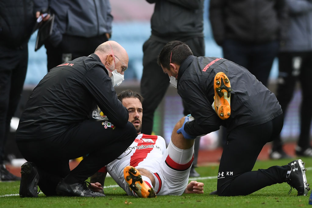 Danny Ings being attended to by some medics during Southampton match against Aston Villa.