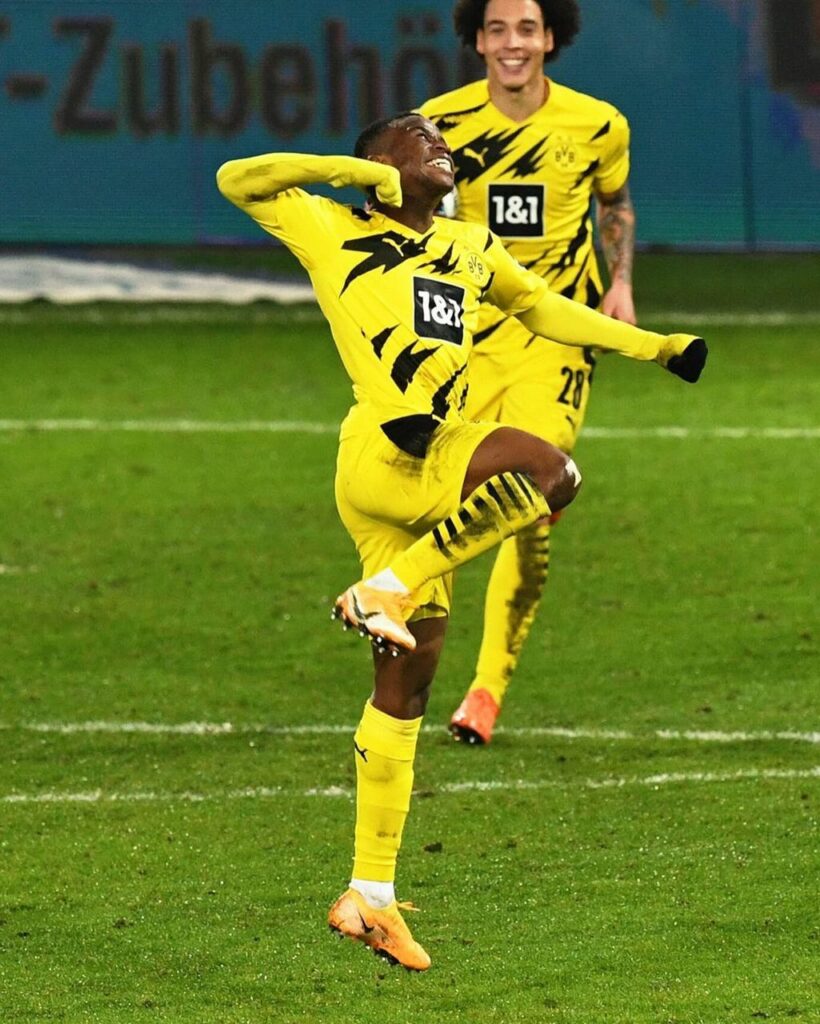 Youssoufa Moukoko celebrates his first Bundesliga goal. 