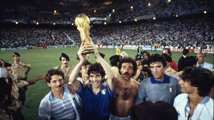 Paolo Rossi lifts the 1982 FIFA World Cup trophy. 