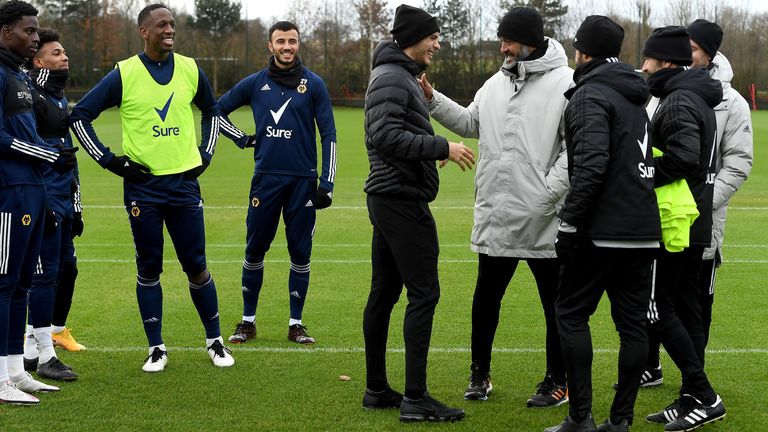 Raul Jimenez being welcomed by his teammates at the club's training ground on Wednesday. 