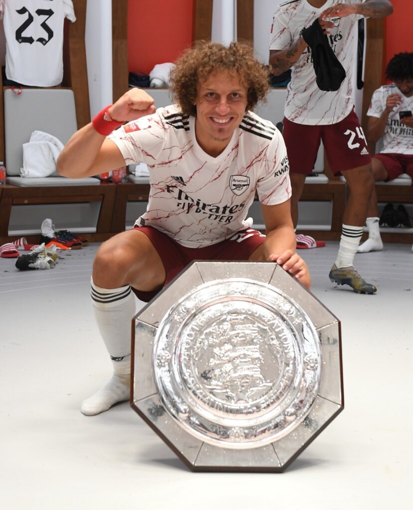 David Luiz with the Community Shield Arsenal won after defeating Liverpool last summer.
