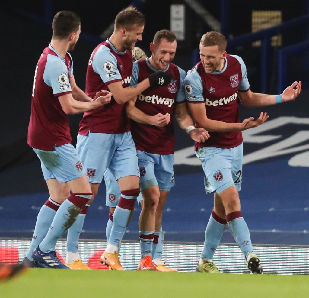 West Ham United players celebrate their goal against Everton.