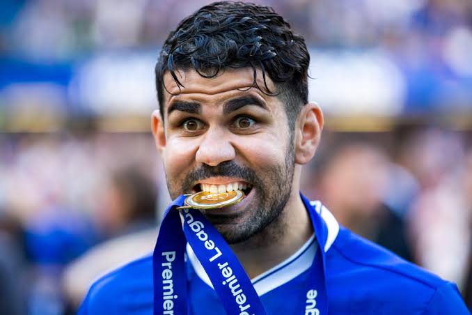 Diego Costa with a Premier League medal while at Chelsea.