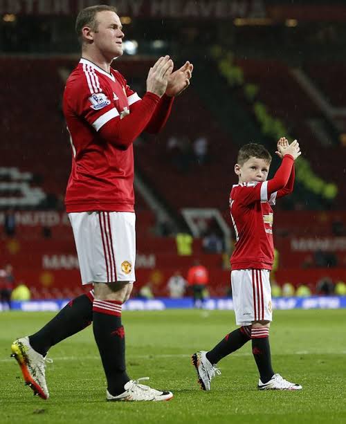 Wayne Rooney and his son, Kai when Rooney was still at Manchester United.