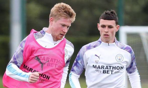 Kevin De Bruyne and Phil Foden in training.