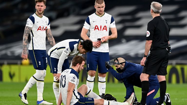 Harry Kane being treated by Tottenham's medical team on the pitch on Thursday night, January 28.