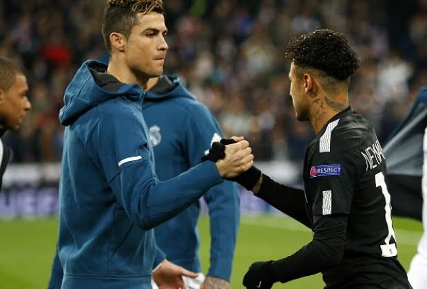 Cristiano Ronaldo and Neymar in a Champions League match involving PSG and Real Madrid.