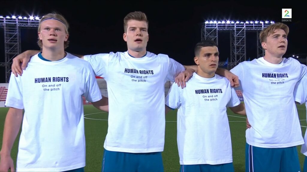 Norway players wear white T-shirts with the inscription: 'Human rights ' on and off the pitch