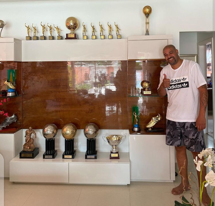 Adriano flaunting his trophy cabinet.