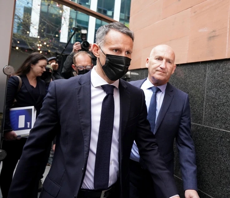 Ryan Giggs on his way out of the court after his first court appearance over the Coercive or controlling behavior against his ex-girlfriend and sister. 