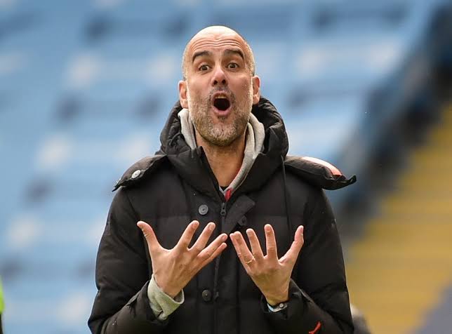 Pep Guardiola, the manager of Manchester City.