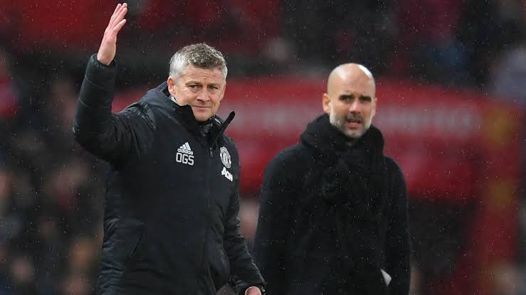 Solskjaer of Manchester United and Pep Guardiola of Manchester City.
