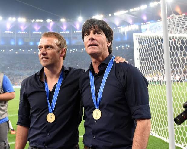 Hansi Flick and Joachim Low with their World Cup medal in 2016. 