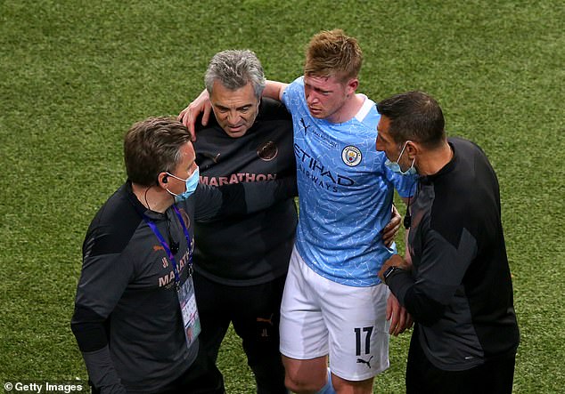 Kevin de Bruyne being helped out of the pitch after his collision with Chelsea's Antonio Rudiger.