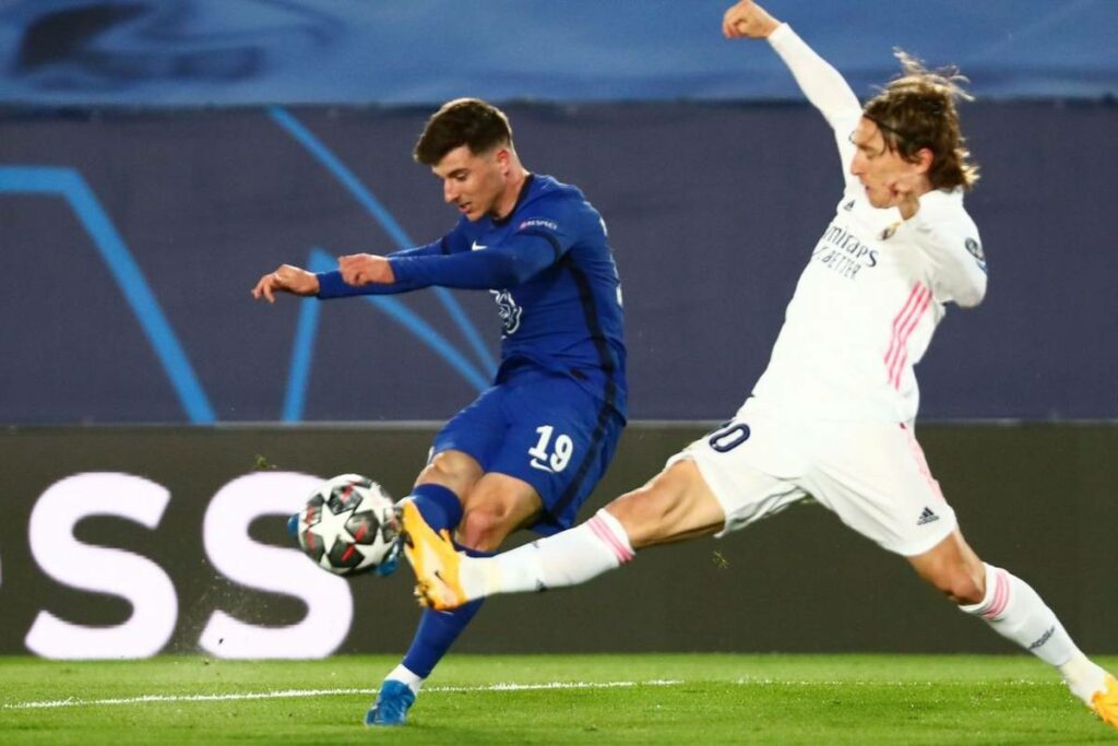 Mason Mount and Luka Modric battle for the ball during the UEFA Champions League semi-final last season