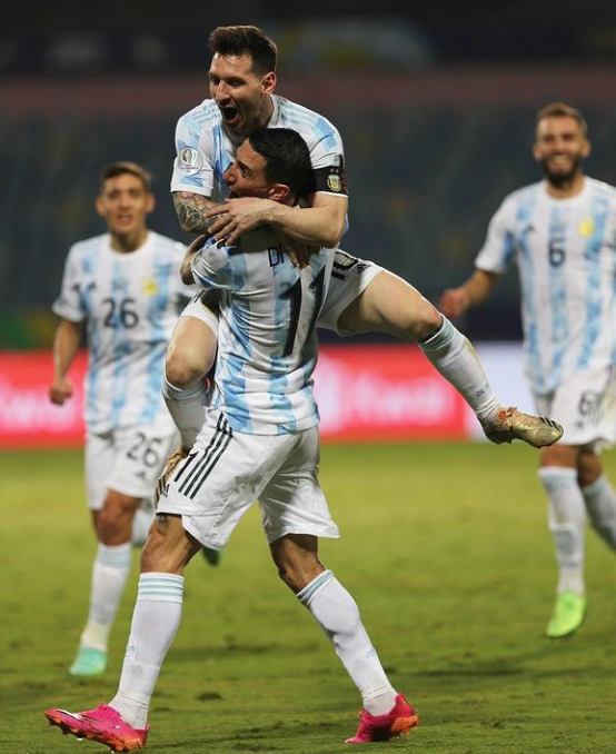 Lionel Messi celebrates with Angel Di Maria.