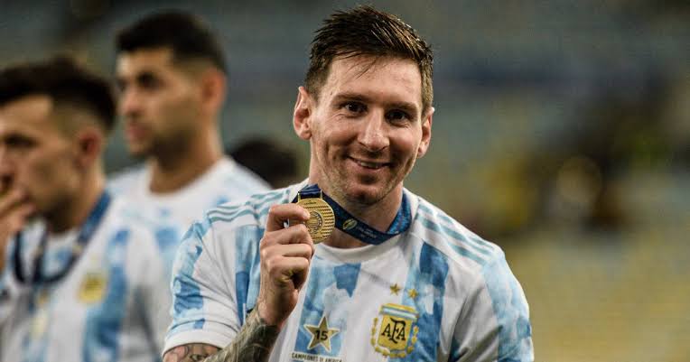 Lionel Messi celebrating his Copa America medal which he won in Brazil on July 11.