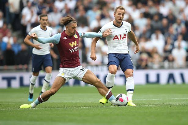 Henry Kane and Jack Grealish are in action in a Premier League game between Tottenham and Aston Villa.