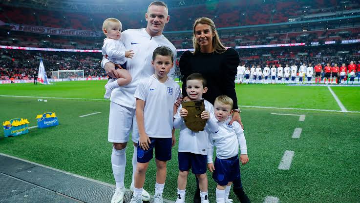 Wayne Rooney, his wife Coleen, and their four boys. 