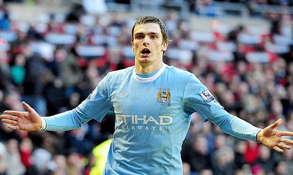 Adam Johnson celebrates one of the over 11 goals he scored for Manchester City.