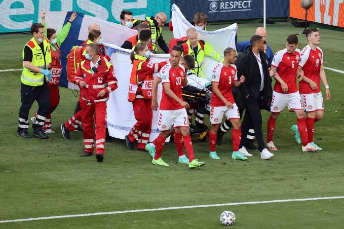 Christian Eriksen being taken off the stadium after he suffered a cardiac arrest.