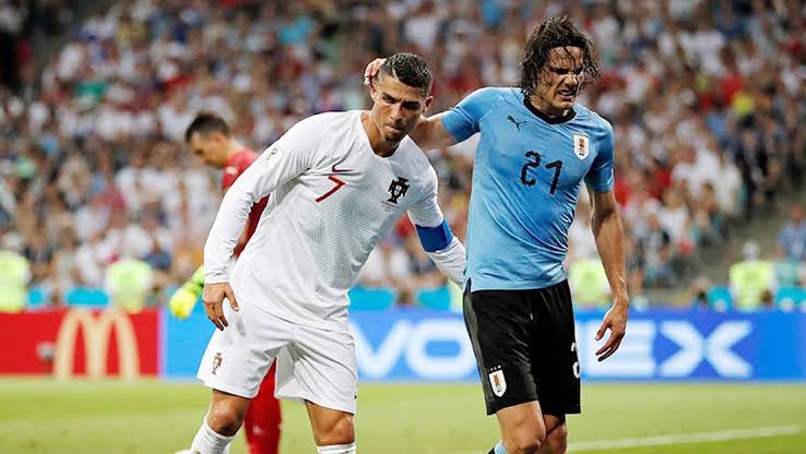 Cristiano Ronaldo and Edison Cavani during an international game between Portugal and Uruguay.