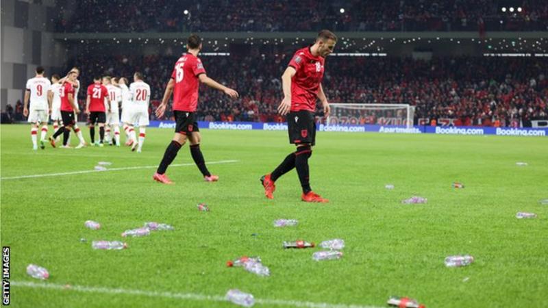 Albania vs Poland World Cup qualification match was put on hold for 20 minutes after Albania fans threw plastic bottles to the pitch. 