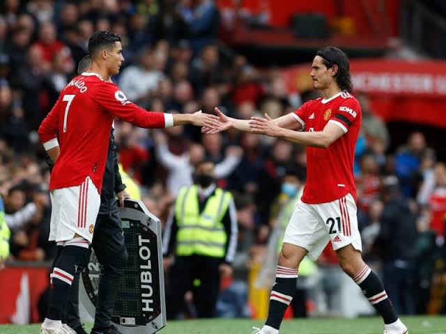 Cristiano Ronaldo coming in for Edison Cavani during Manchester United and Everton league game. 