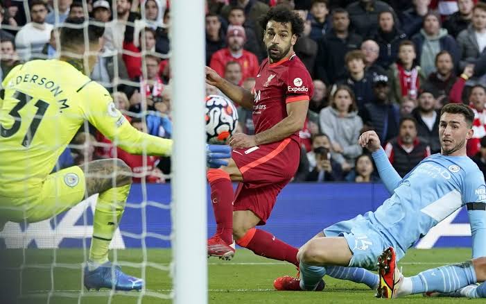 Mohamed Salah watch as his stunning effort found the back of the net. 