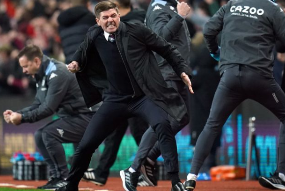 Steven Gerrard celebrates Aston Villa's victory over Brighton. 