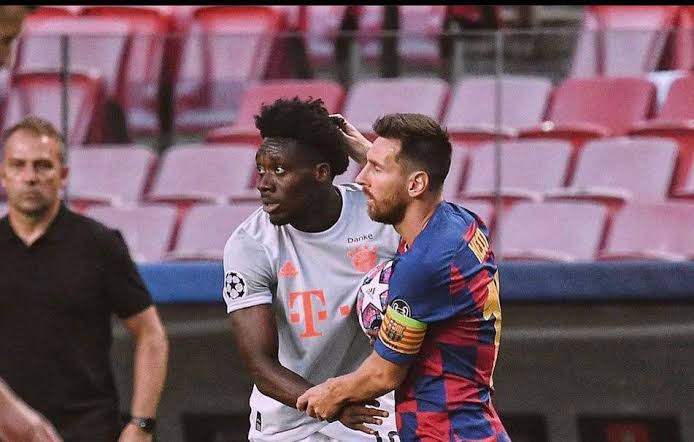Alphonso Davies and Lionel Messi in 2020. 